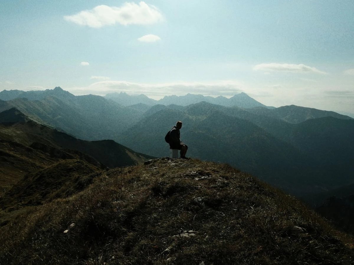 Hiker in mountain landscape.